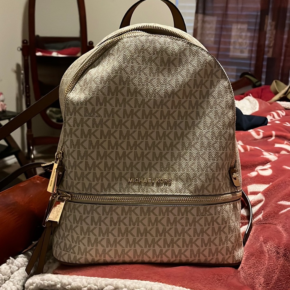 Cream and gold MK bag. Slightly loved, no damage